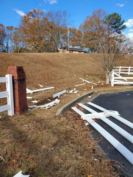 Before: 3 rail vinyl fence smashed across the entrance